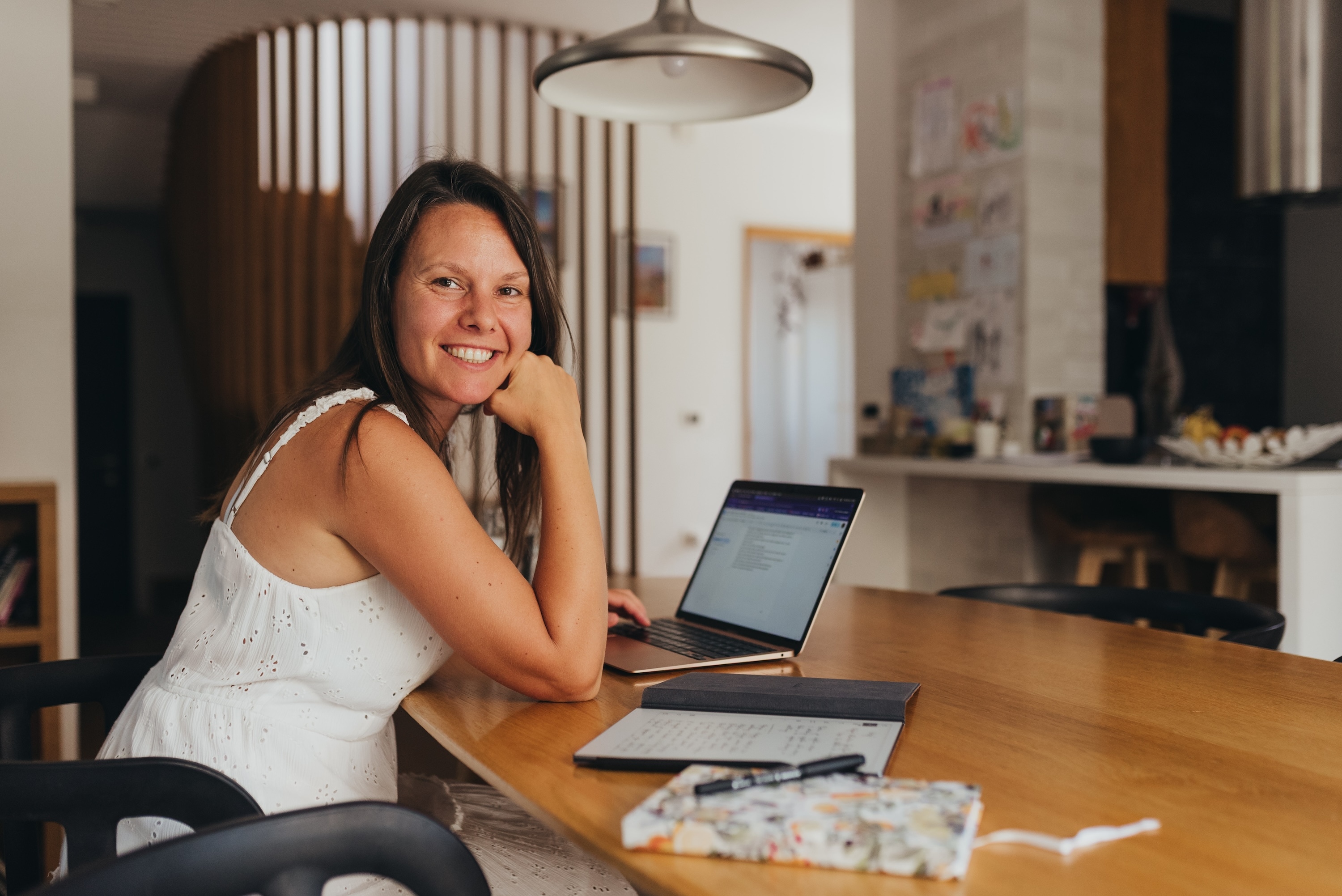 Nadja Ebner smiling behind table